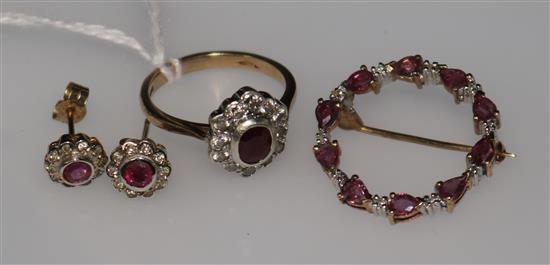 A ruby and diamond 9ct gold cluster ring, a similar target brooch and a pair of earrings.